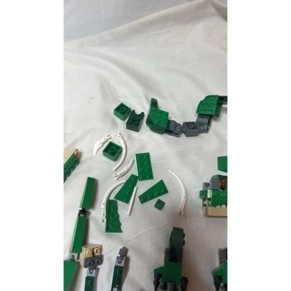 Lego Creator 3 in 1 Mighty Dinosaur Pieces.